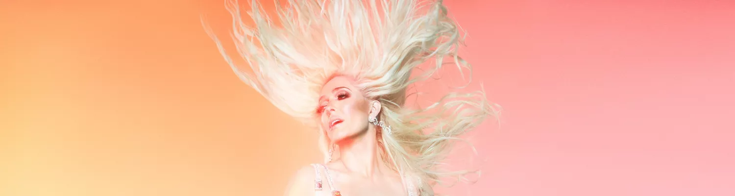 Art for 'Erika Jayne: Bet It All on Blonde' with Erika Jayne dancing