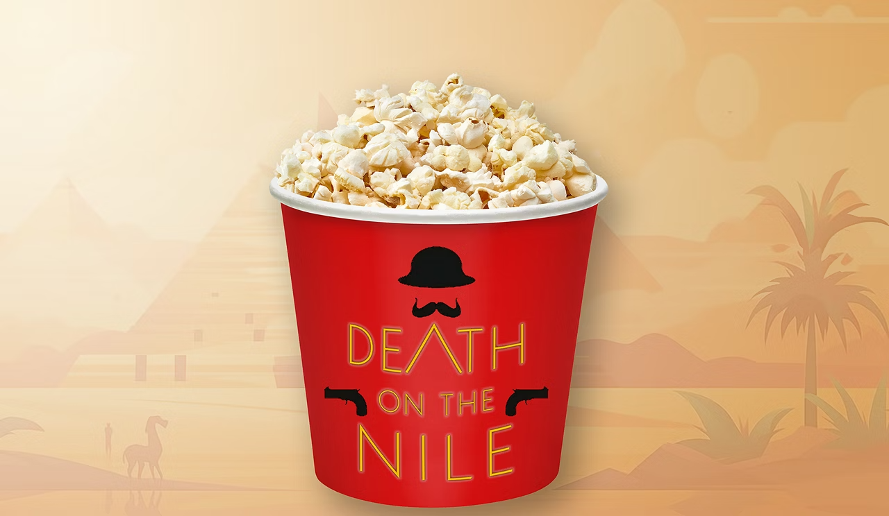 A popcorn bucket with Death on the Nile branding