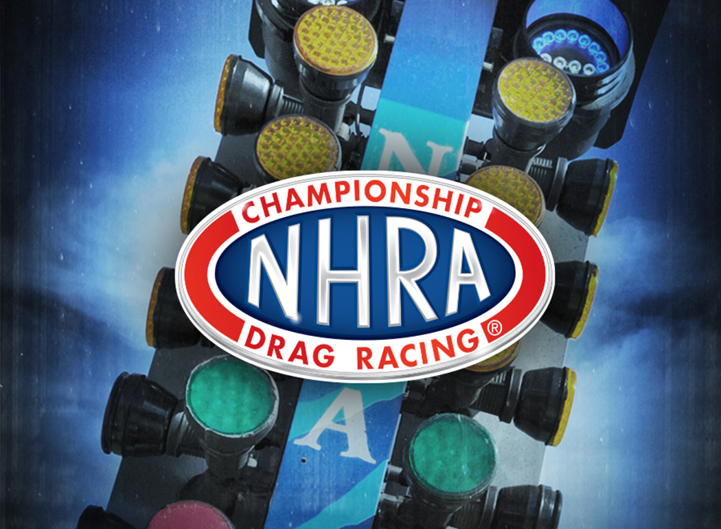 Stock photo of a drag racing "Christmas tree" with the NHRA logo in front.