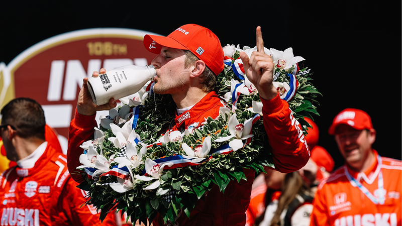 Marcus Ericsson drinks the milk after winning the 2022 Indianapolis 500.