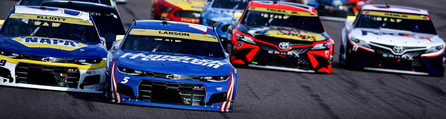 Image of Chase Elliott and Kyle Larson battling for the lead at Phoenix Raceway in November 2021 with the "NBC" and "USA" logos superimposed on top of them.